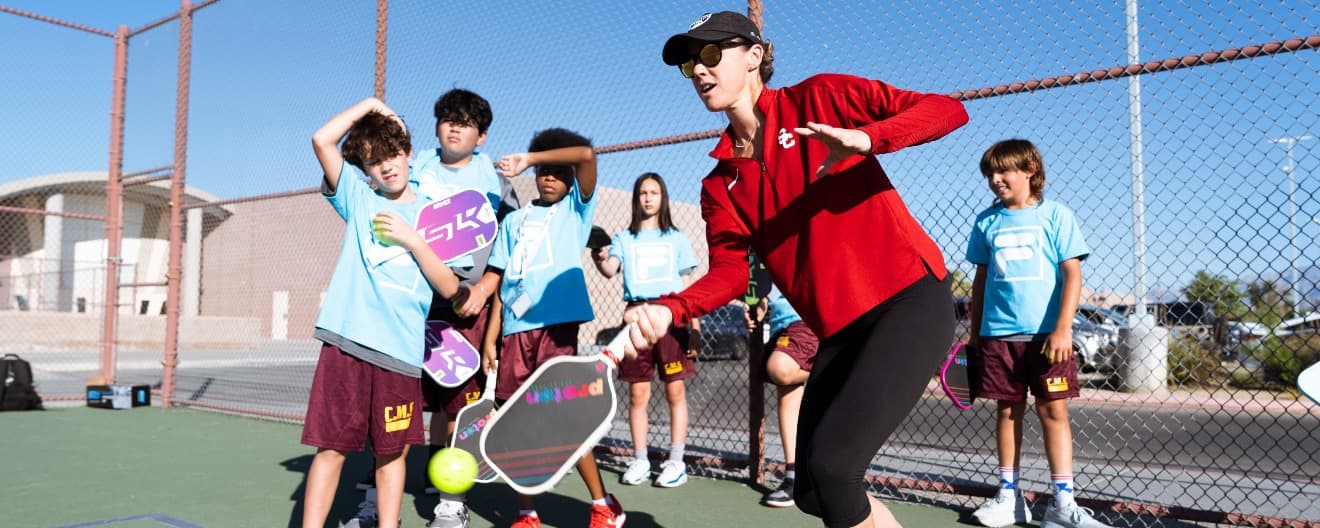 Kaitlyn Christian working with students at Cadwallader Middle School in Las Vegas.