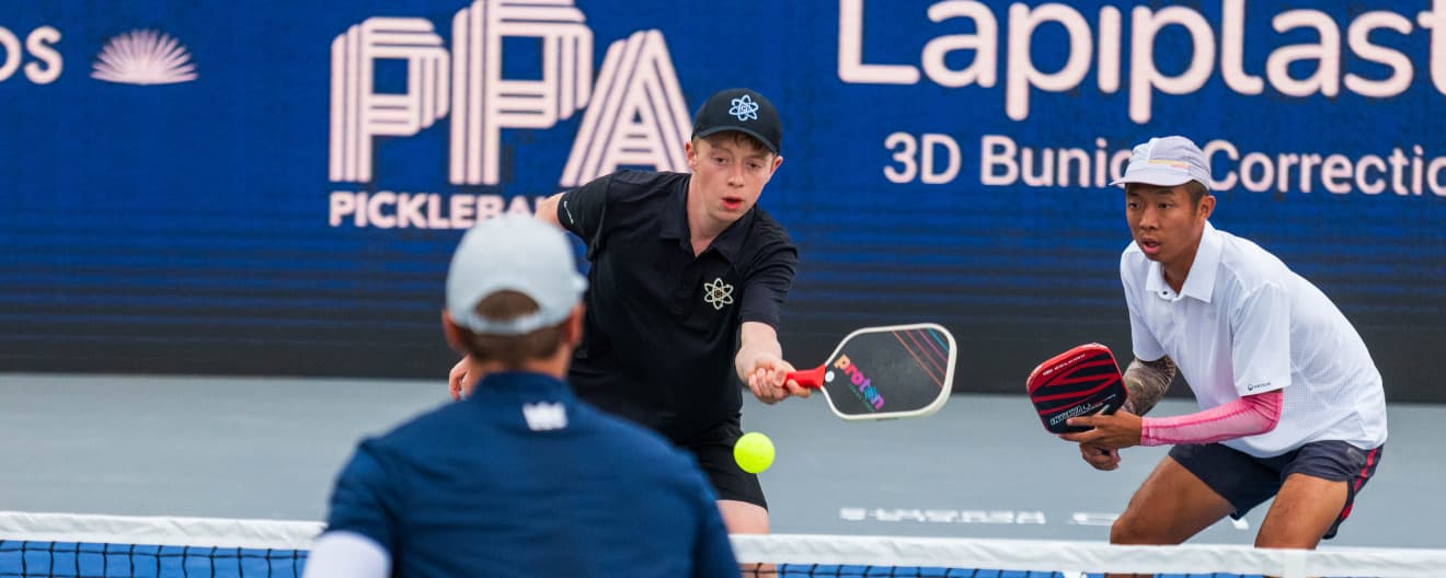 CJ Klinger and Quang Duong competing at the Lapiplasty Pickleball World Championships.