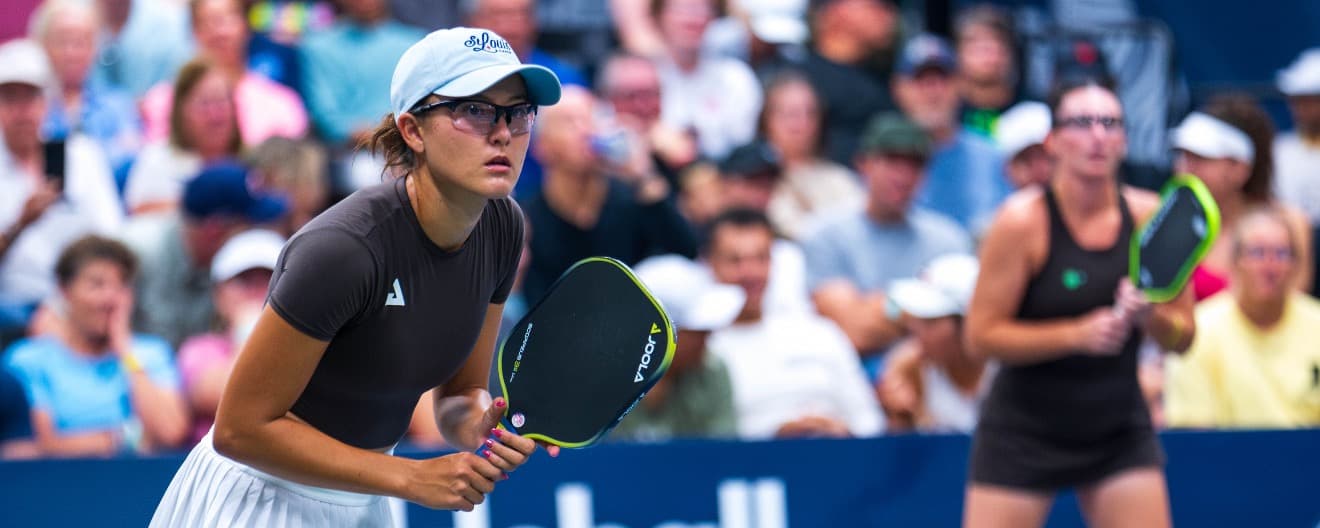 Anna Bright staring down her opponent on the pro pickleball court
