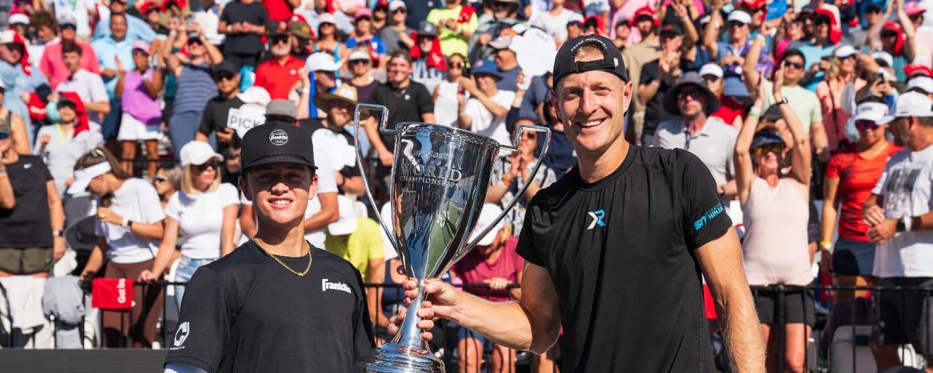 Hayden Patriquin and Riley Newman celebrate their title at the Lapiplasty Pickleball World Championships.