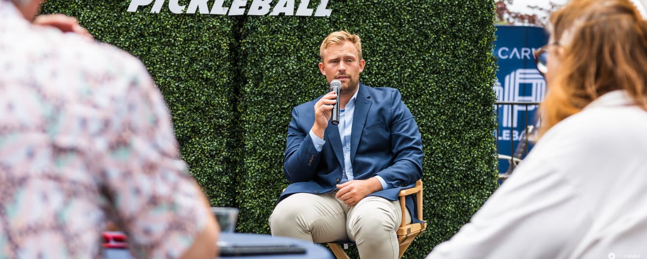Connor Pardoe speaking at a Fila Talk.