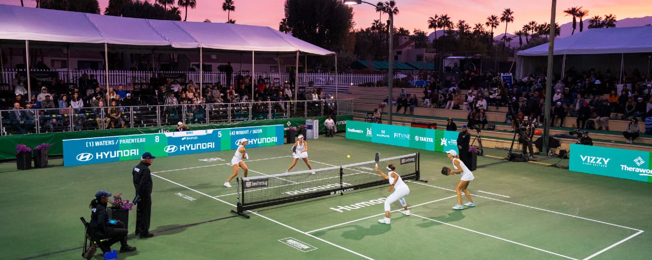 A women's doubles match at The Masters in 2024.