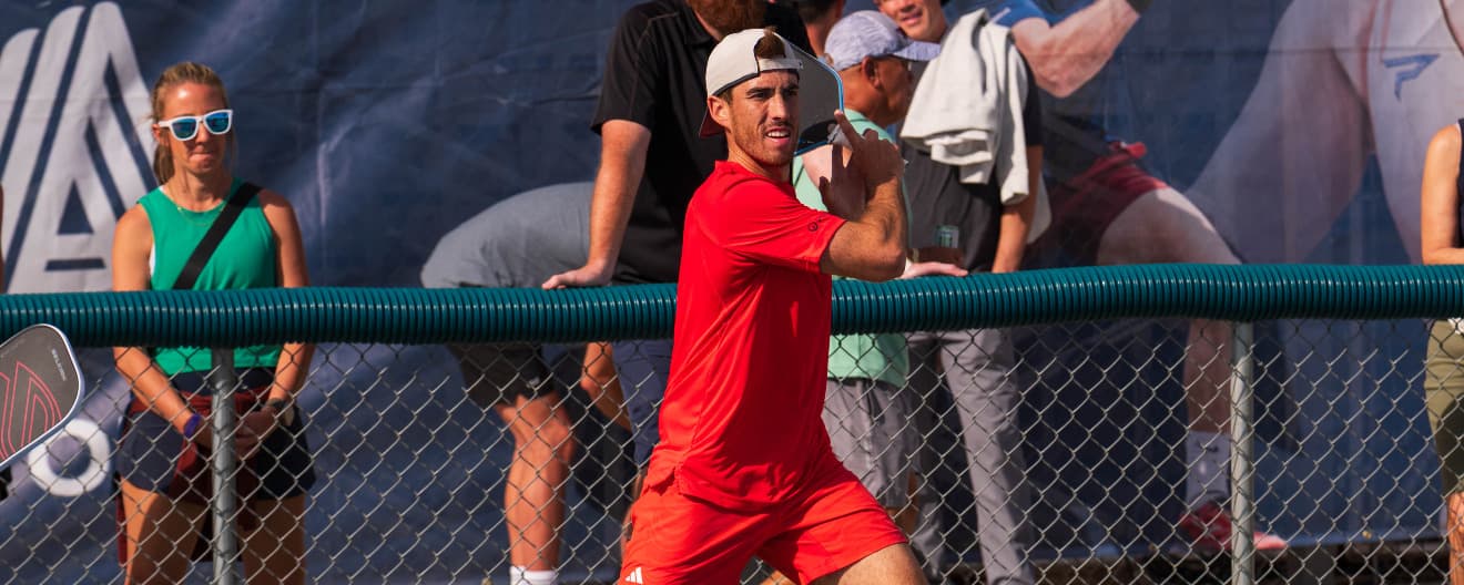 Federico Staksrud hitting a forehand.