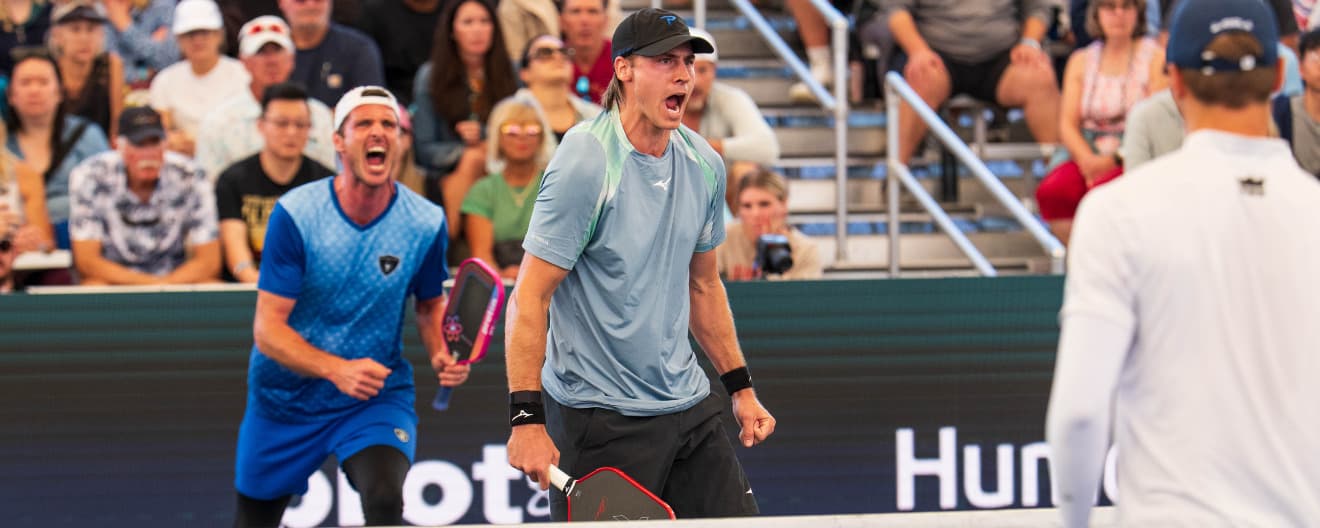 Christian Alshon and Andrei Daescu celebrate their victory.
