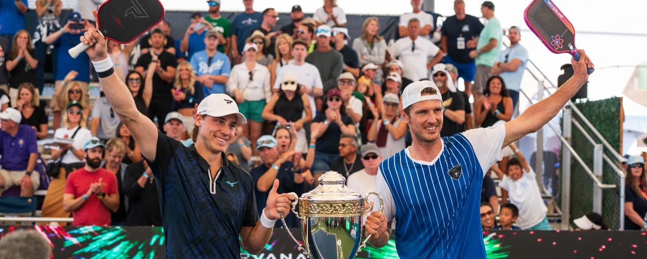 Christian Alshon and Andrei Daescu celebrate their doubles title in Mesa.