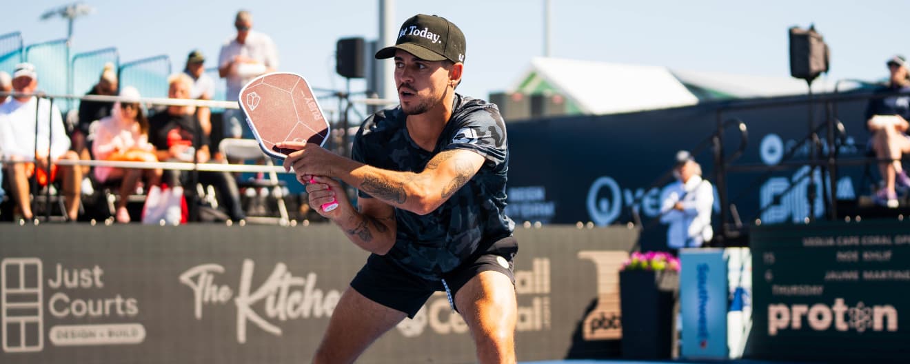 Jaume Martinez Vich hits a backhand volley.