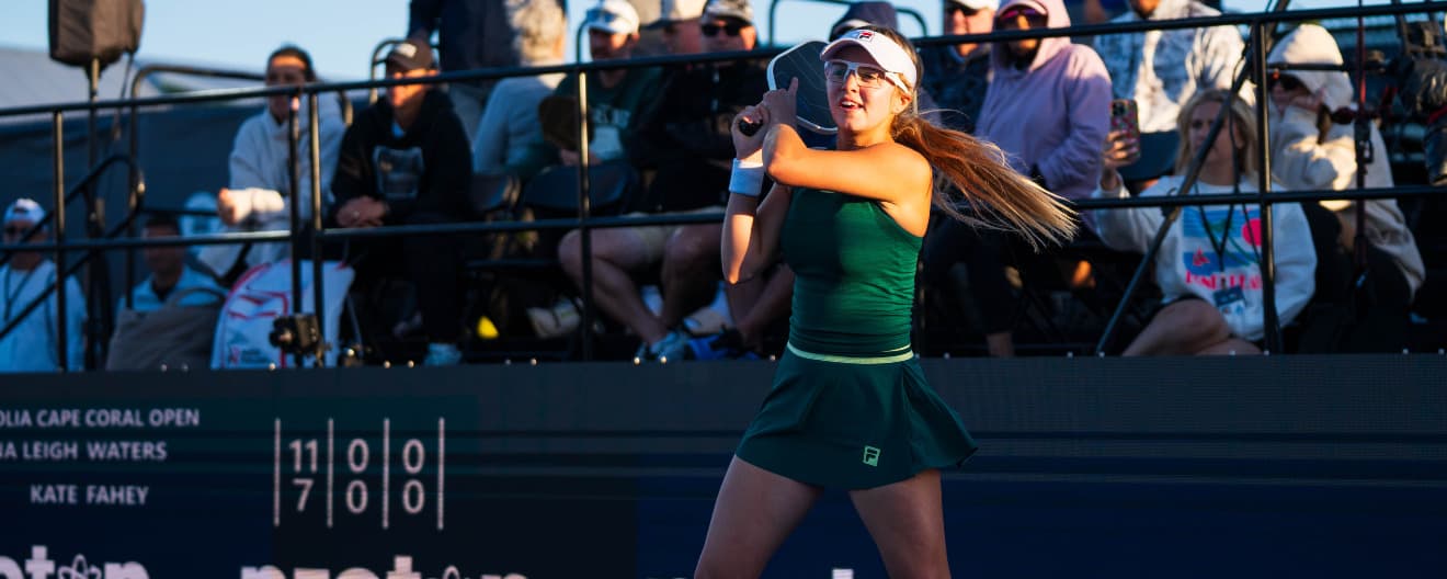 Anna Leigh Waters hits a backhand playing women's singles.
