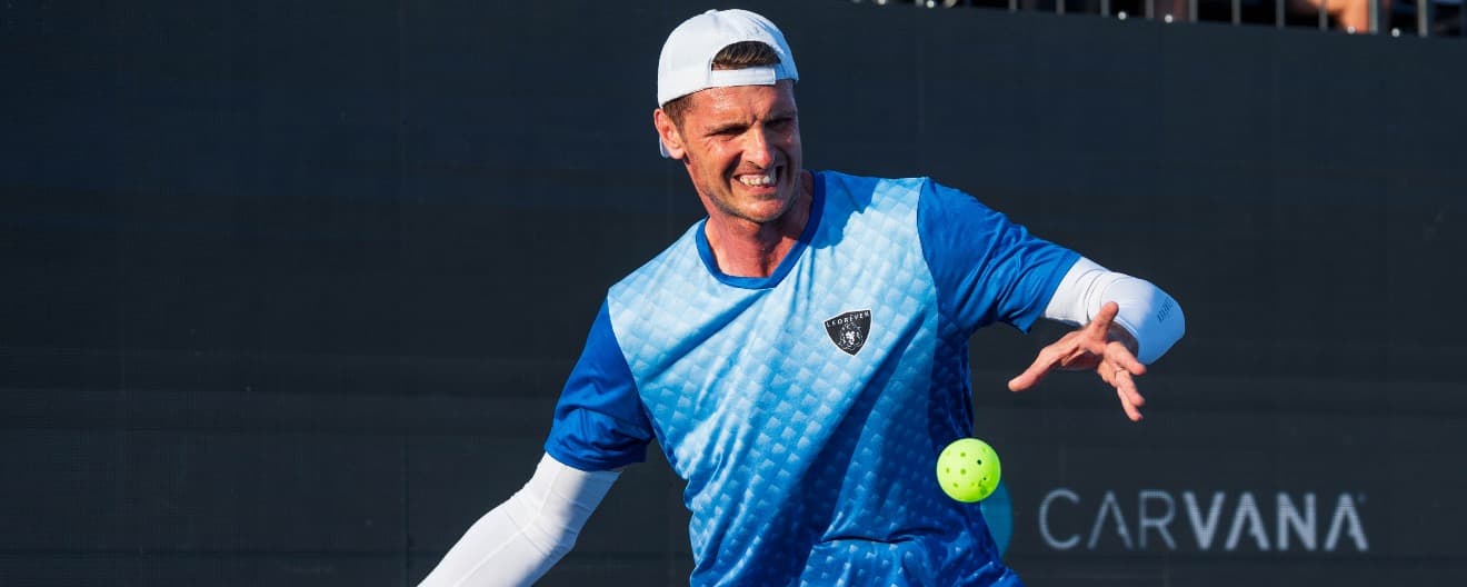 Andrei Daescu preparing to serve.