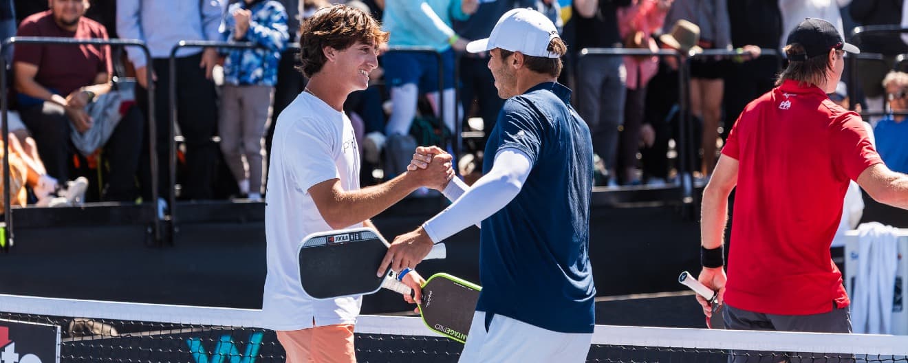 Gabe Tardio and Ben Johns celebrate their men's doubles title in Texas.