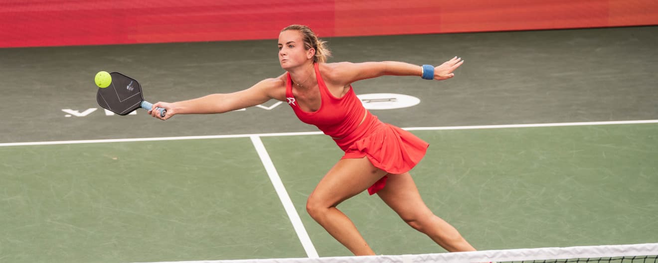 Kate Fahey hits a forehand volley.