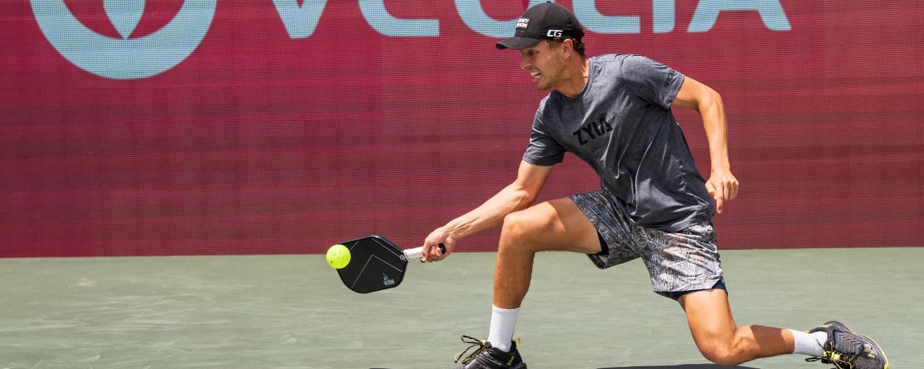 Connor Garnett hitting a pickleball forehand.