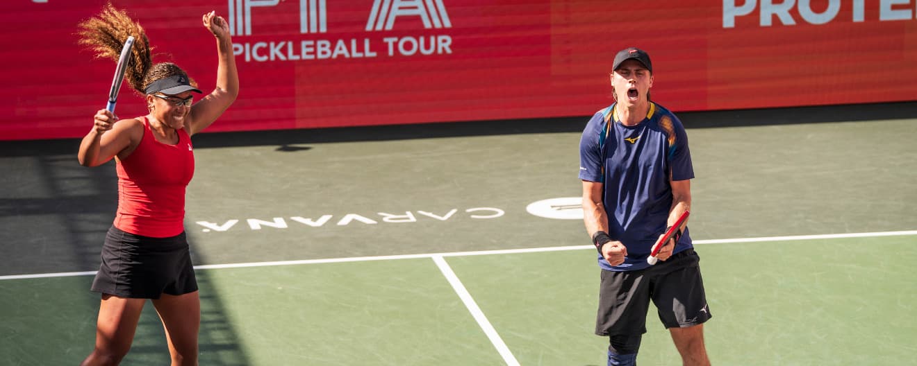 Etta Tuionetoa and Chrisitian Alshon celebrating their semifinal victory at the Veolia Atlanta Pickleball Championships presented by Ensure Max Protein.