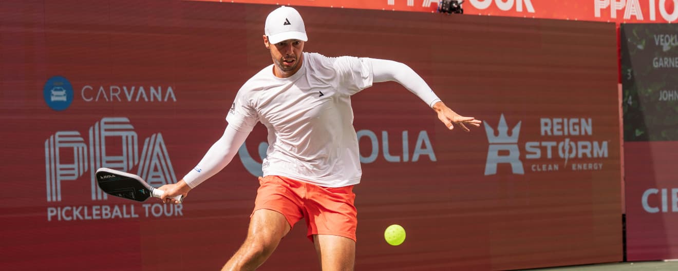 Ben Johns hitting a pickleball forehand.