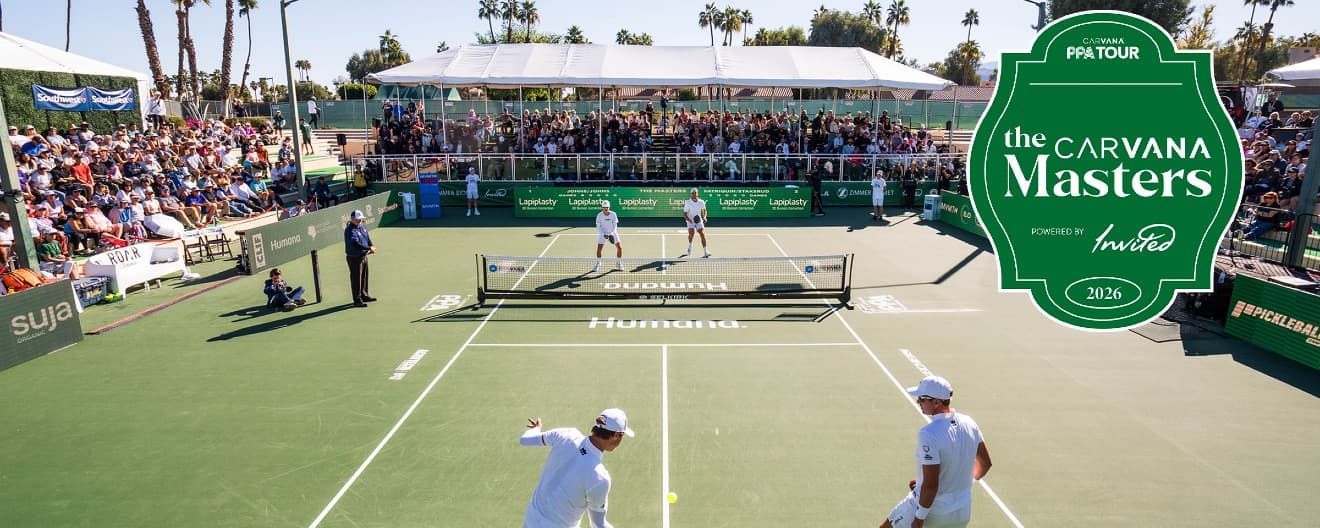 Players competing on a pickleball court.