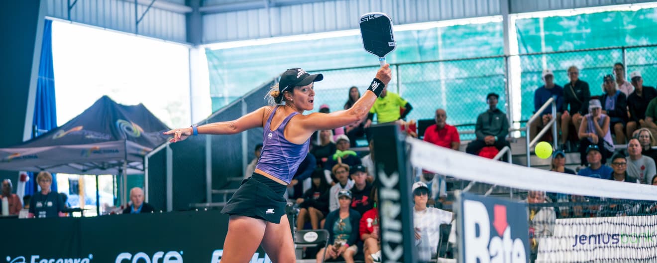 Catherine Parenteau hits a pickleball forehand.