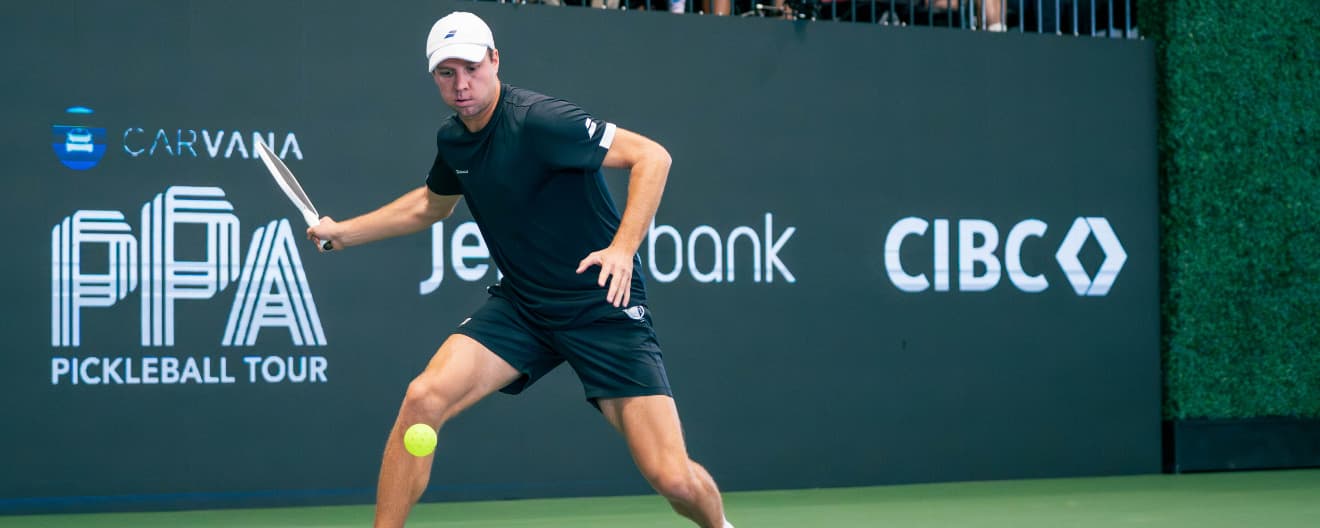 Chris Haworth hitting a pickleball forehand.