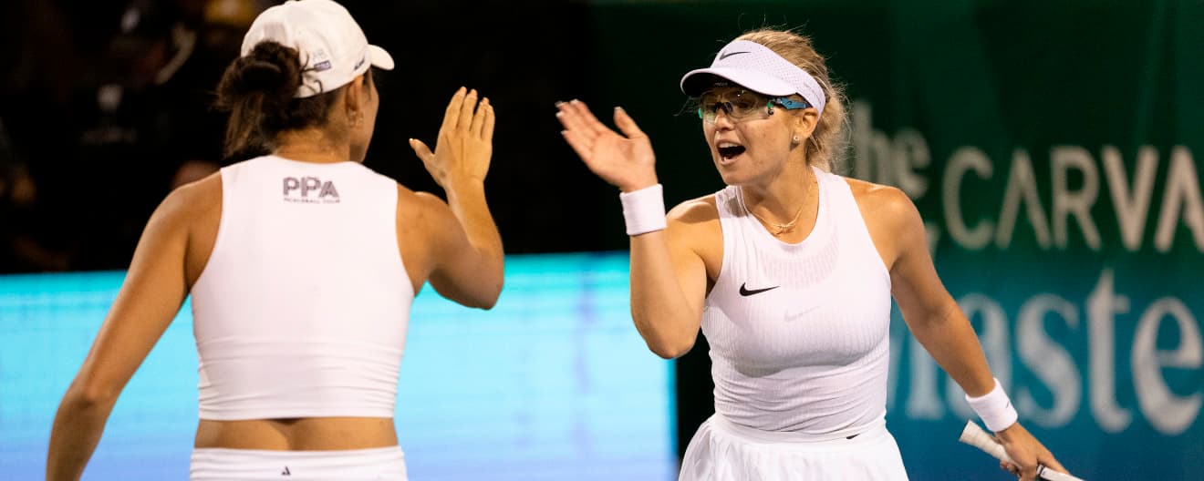 Anna Leigh Waters and Anna Bright celebrate a women's doubles point at the PPA Masters in Rancho Mirage, CA.