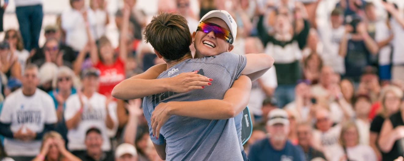 Bright and Patriquin embrace after defeating Johns and Waters at the Carvana Mesa Cup