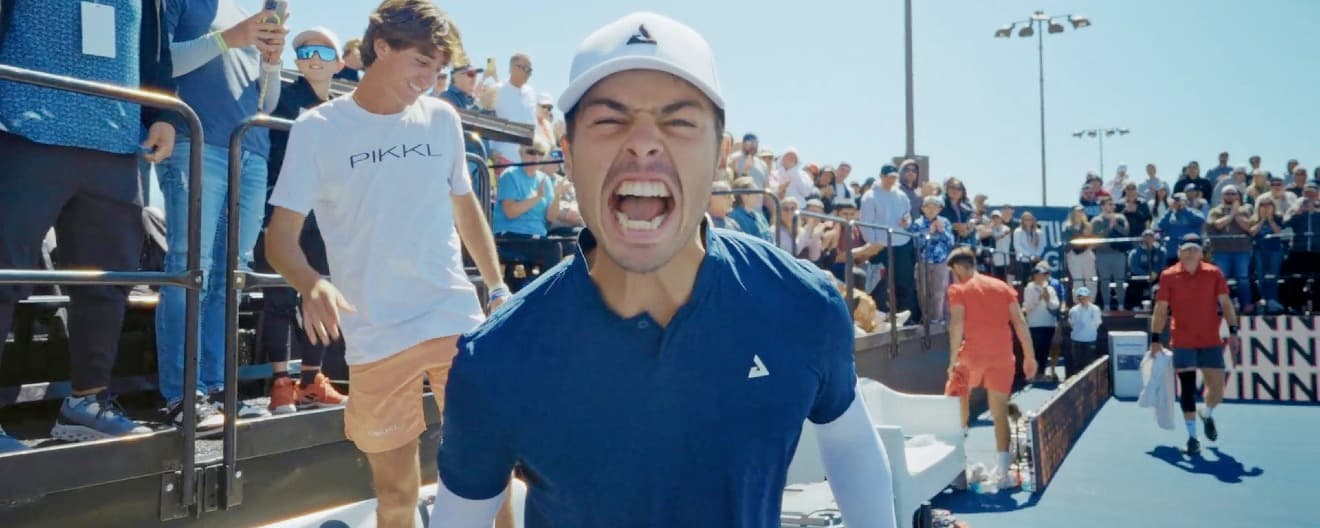 Ben Johns screaming at the camera at a pickleball tournament.